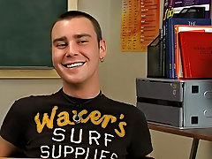 Issue ones brunette twink Justin Giles sits at a desk in a classroom and the man behind the camera asks him questions about his experience in porn, hi